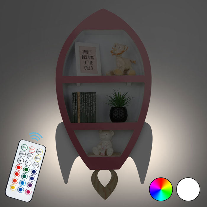 Rocket shaped nursery shelf in pink and white illuminated.