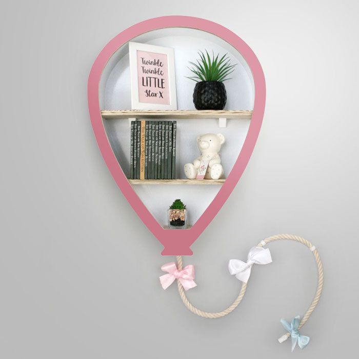 Balloon shaped nursery shelves in pink.