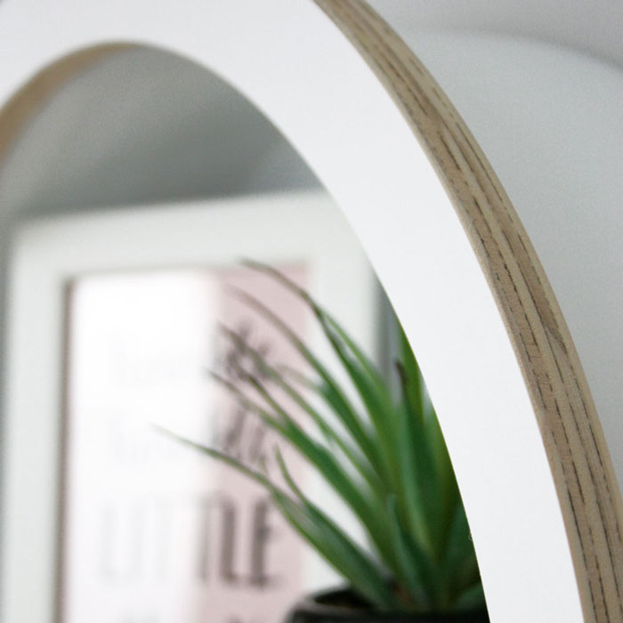 Balloon shaped nursery shelves in white arch detail.