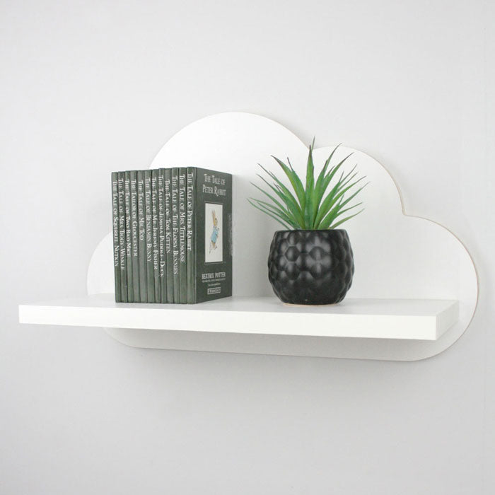 Flouting loud shaped nursery shelf in white side view.