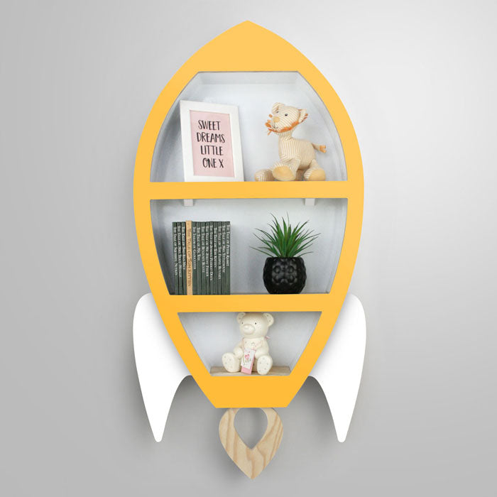 Rocket shaped nursery shelf in yellow and white.