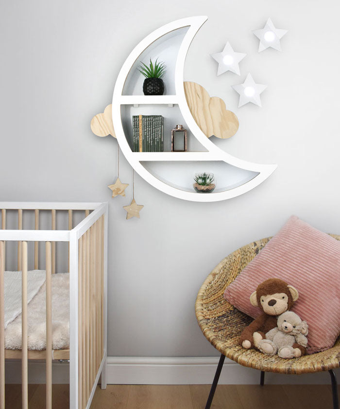 Wall mounted star lights in nursery room setting with moon shelf.