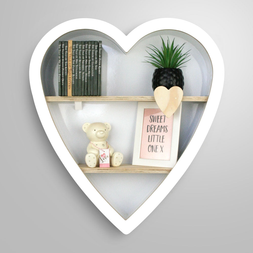 Heart shaped nursery shelf in white.M
