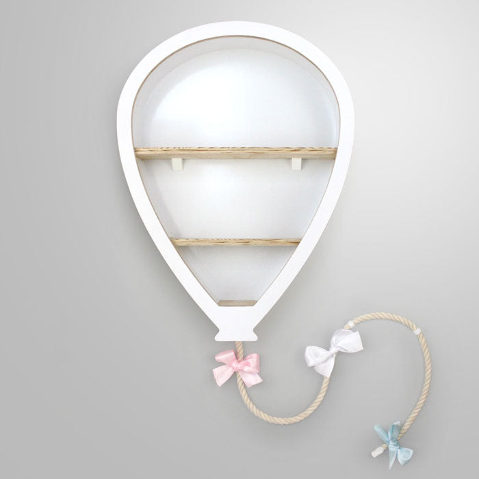 Balloon shaped nursery shelves in white with rope and bows.