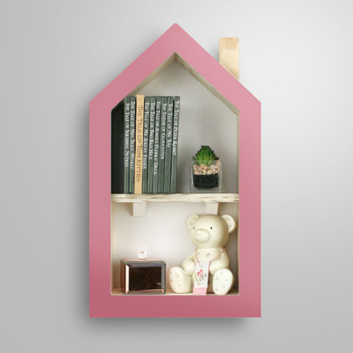 House shaped nursery shelf in pink.