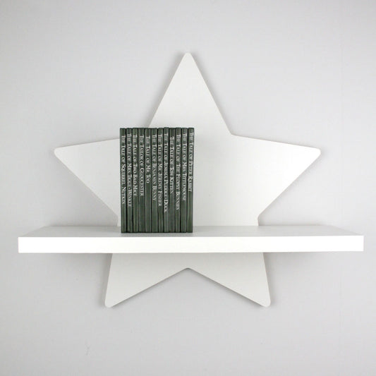 Star shaped nursery shelf in white.M