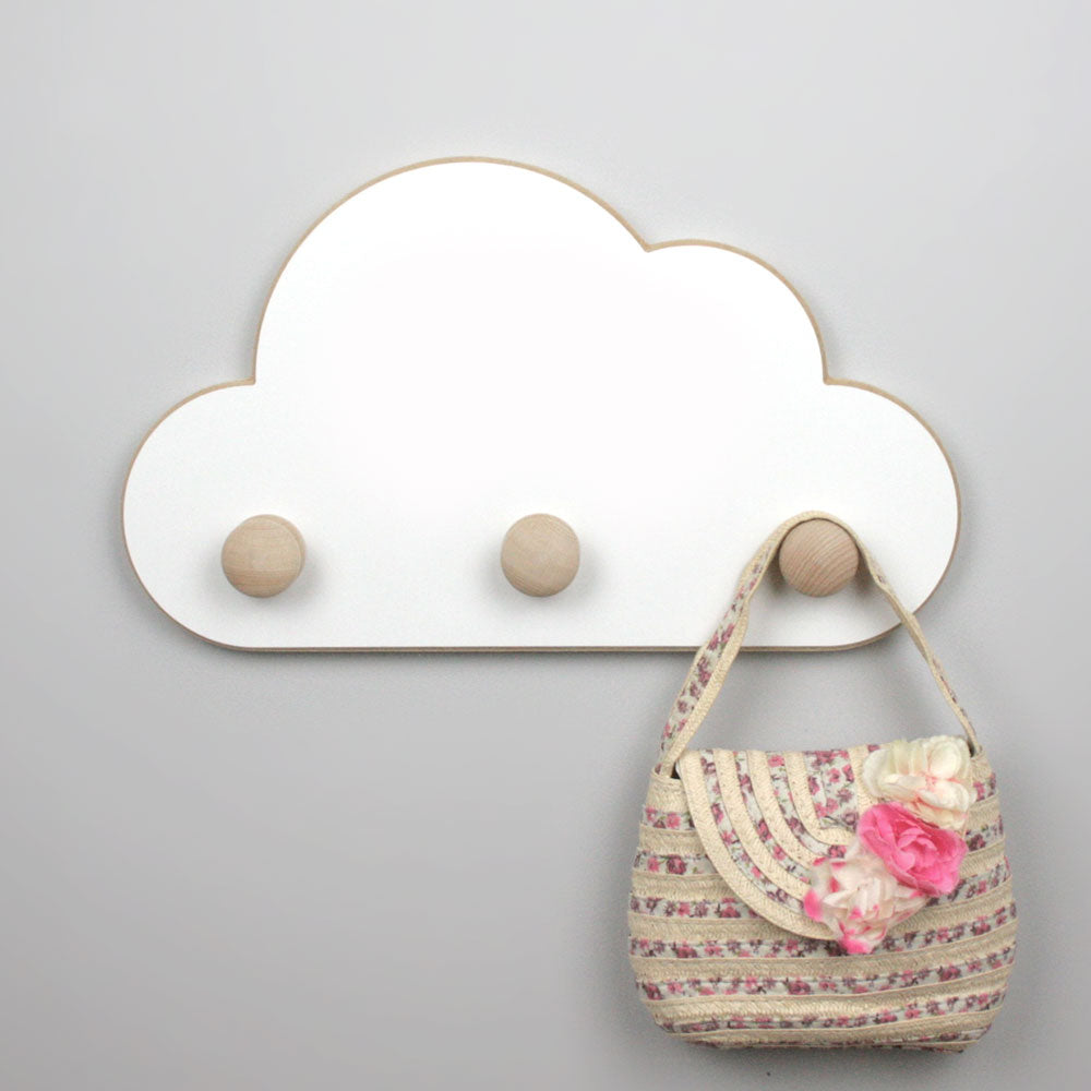 Cloud shaped nursery knob hangers in white.