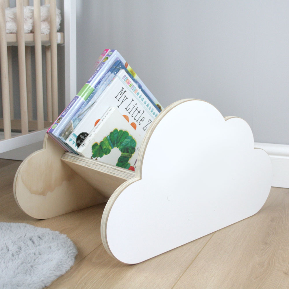 Cloud shaped book rack in nursery room setting.M